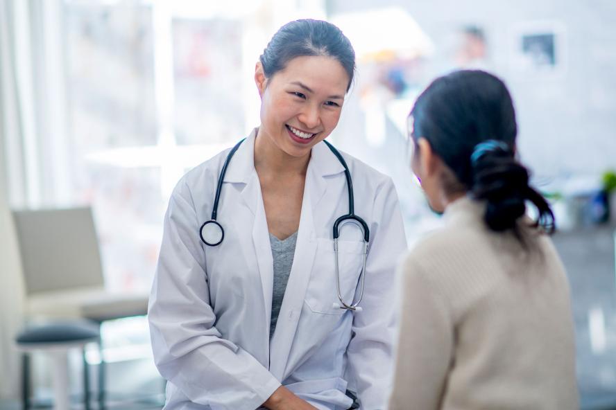 a doctor conversing with a patient